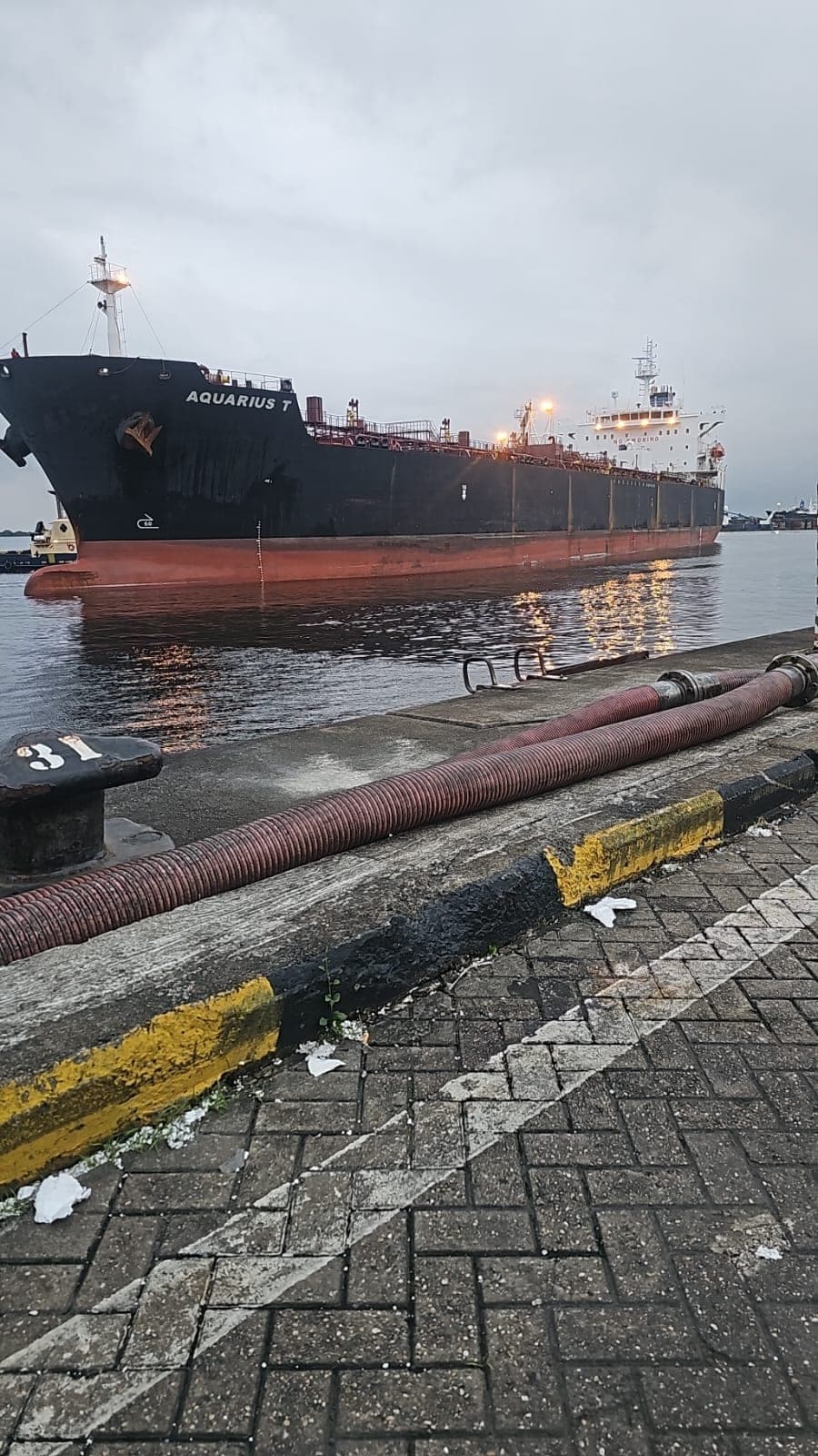 Tanker vessel berthed at port during a CME survey